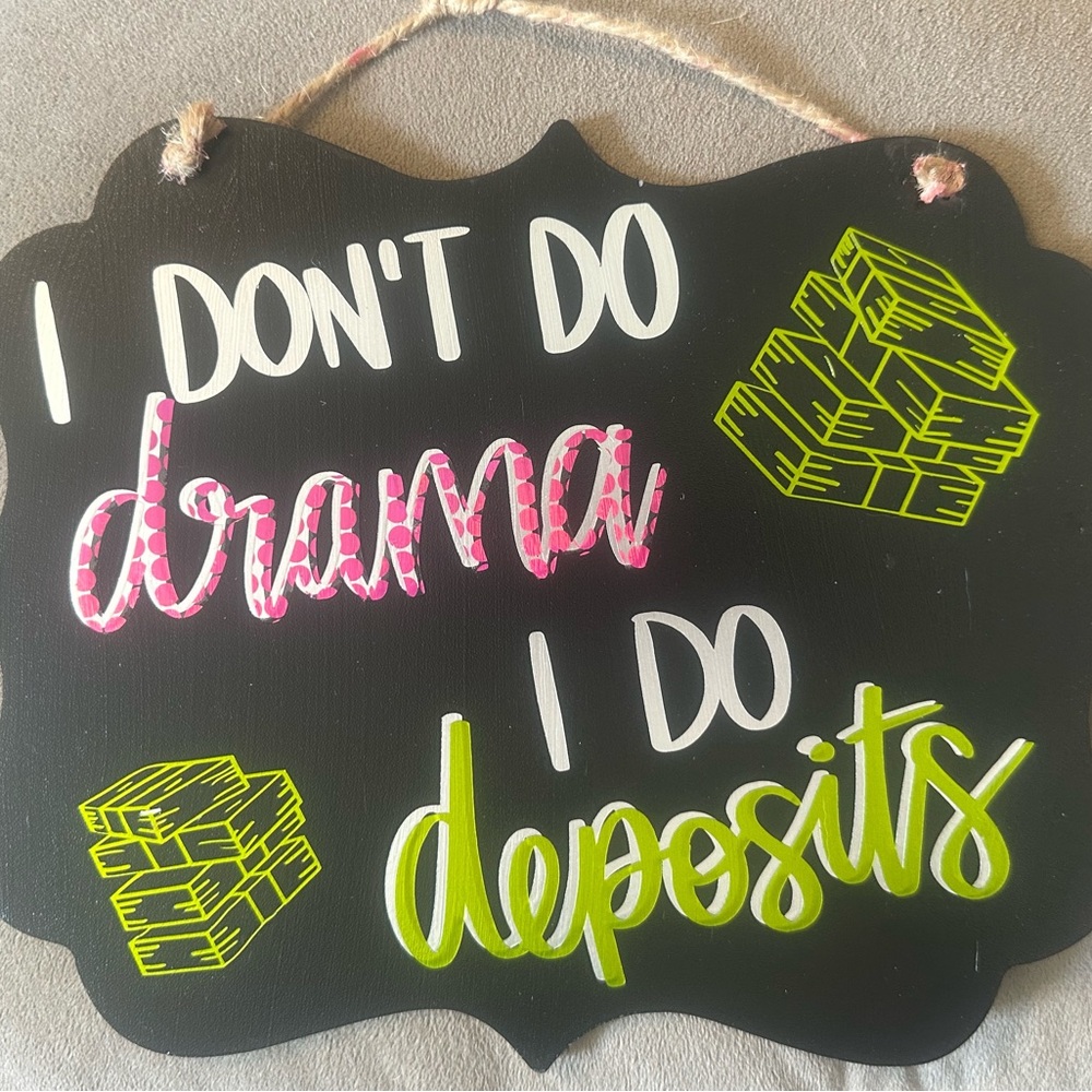 Black and Pink Decorative Sign